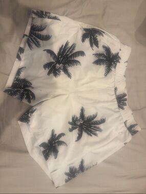 White Swim Shorts with Black Palm Tree Print